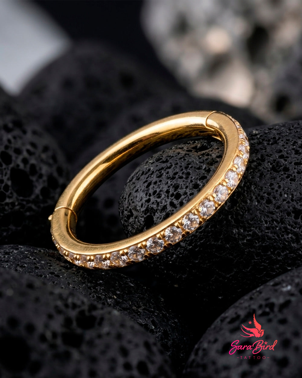 Argola articulada em titânio com zircónias | Clicker