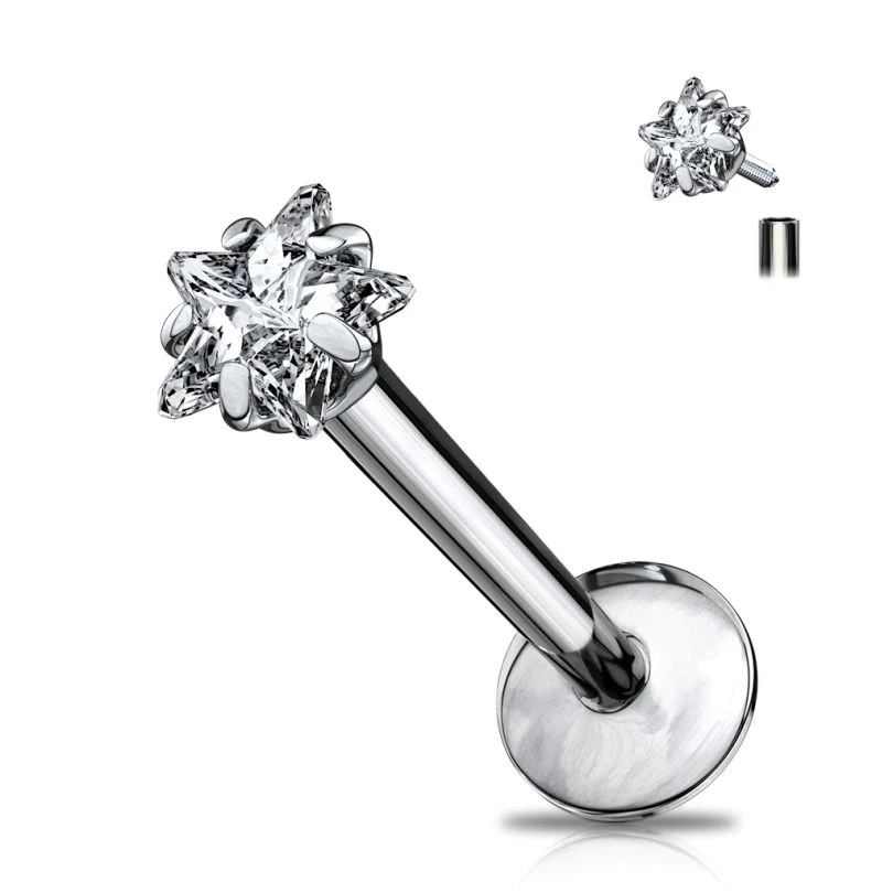 Labret de titanio con diferentes modelos de piedra.