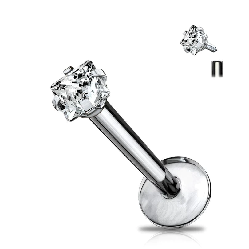 Labret de titanio con diferentes modelos de piedra.