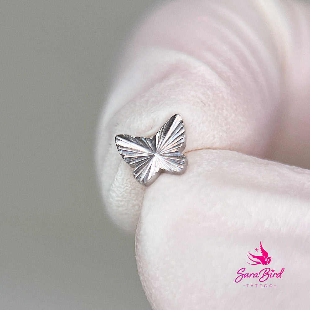 Topo em Titânio com Formato de Borboleta