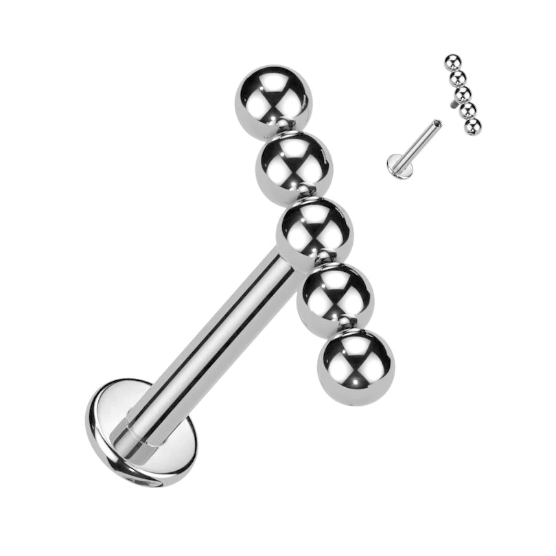 Labret de titanio con cinco cuentas