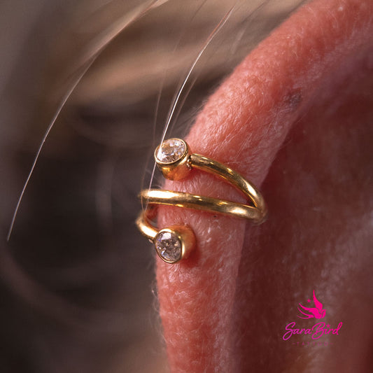 Argola em espiral com duas pedras em zircónia cúbica