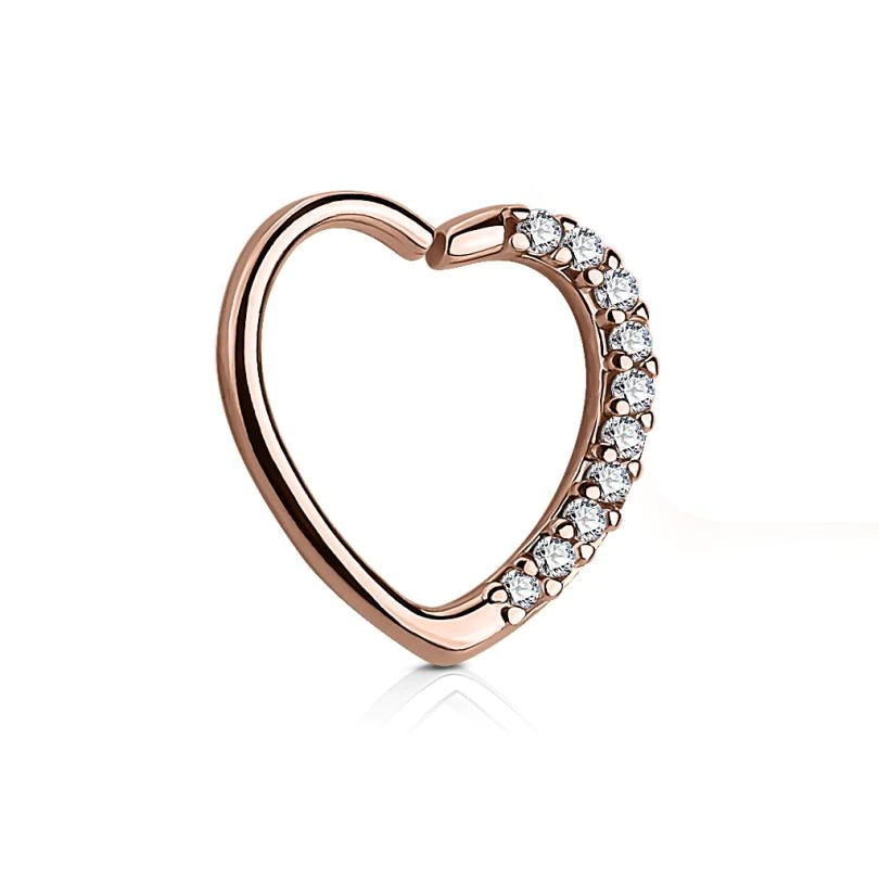 Aro en forma de corazón con hilera de piedras