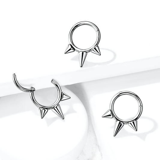 Hinged titanium ring with spikes